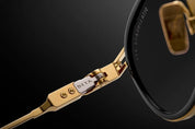 Ottica Mondello Roma - DITA - DTS482-A-01 - LINEAGE.68X - YELLOW GOLD / BLACK / SHINY SILVER - titanium, acetate - shape Round - gold, black - EYEWEAR - SUNGLASSES - Unisex,Uomo,Donna,Women,Men - lens Gradient grey - Made In Japan